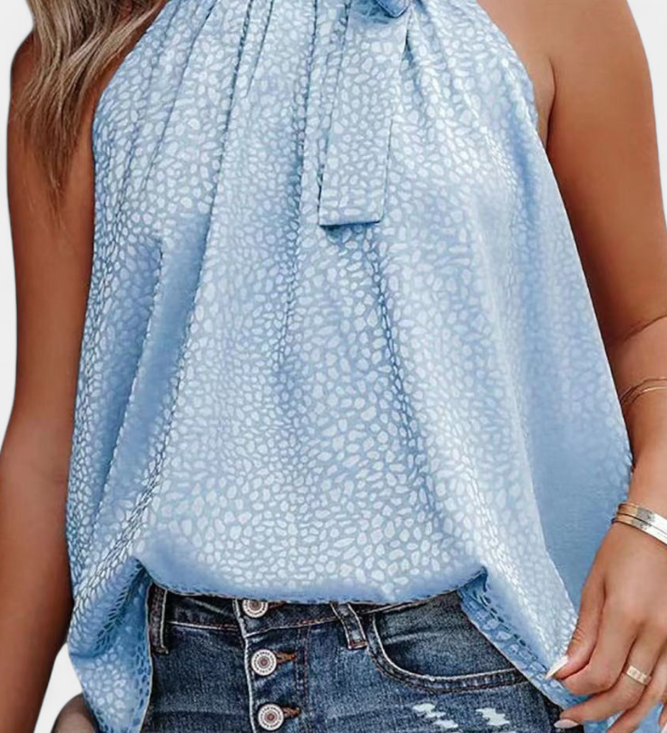Elegante Adela Top sin mangas con estampado de leopardo, cuello alto y lazo para un estilo atrevido y sofisticado