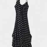 Estefanía Elegante Vestido de Gasa con Volantes y Lunares en Negro y Crema para un Estilo Sofisticado