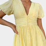 Vestido Maxi Mélia con Escote en V y Mangas Abullonadas - Elegancia y Comodidad para Cualquier Ocasión