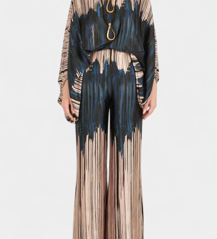 Set de Dos Piezas con Hombros a Descubrir y Pantalones Amplios con Estampado Elegante