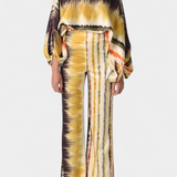 Set de Dos Piezas con Hombros a Descubrir y Pantalones Amplios con Estampado Elegante