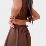 Vestido Midi Griselda con Botones y Diseño de Cintura Abierta para un Look Elegante y Moderno