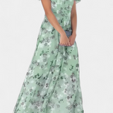Elegante vestido maxi floral con escote en V y mangas aladas para un look sofisticado