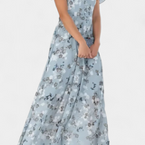 Elegante vestido maxi floral con escote en V y mangas aladas para un look sofisticado