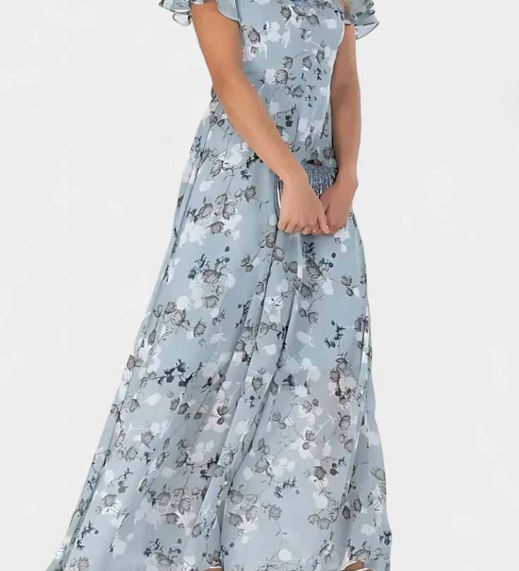 Elegante vestido maxi floral con escote en V y mangas aladas para un look sofisticado