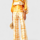 Set de Dos Piezas con Hombros a Descubrir y Pantalones Amplios con Estampado Elegante