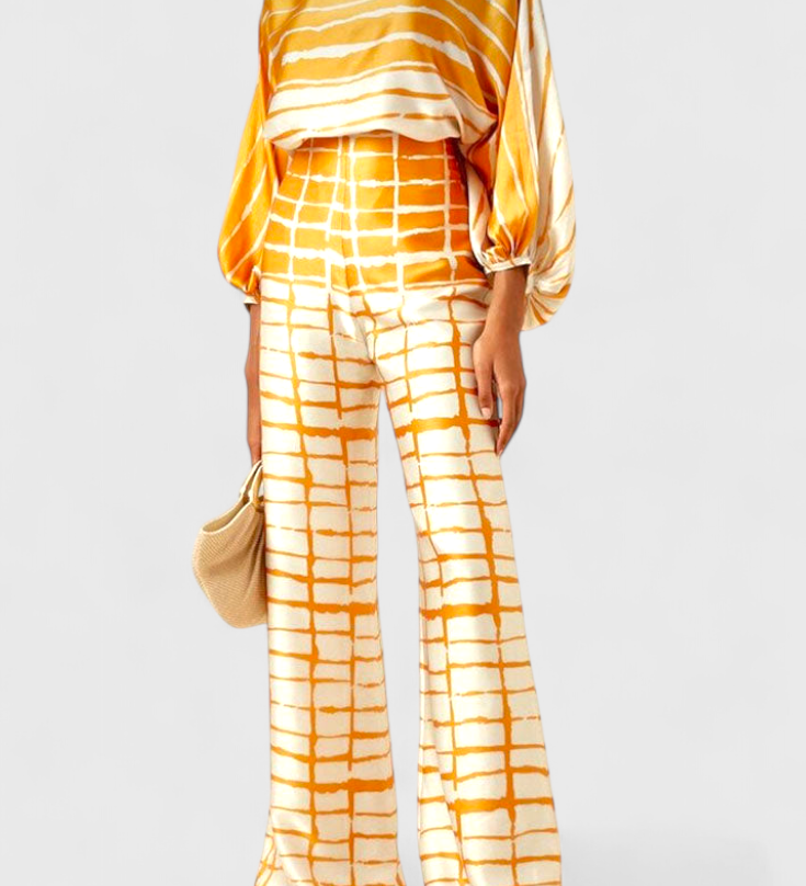 Set de Dos Piezas con Hombros a Descubrir y Pantalones Amplios con Estampado Elegante