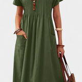 Vestido Lottie de longitud media con bolsillos para un estilo elegante y cómodo