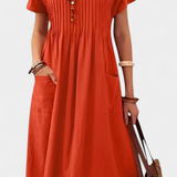 Vestido Lottie de longitud media con bolsillos para un estilo elegante y cómodo