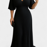 Elegante vestido plisado fluido con espalda abierta para ocasiones memorables