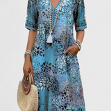 Vestido Boho Perla con Encantador Estampado Floral y Detalles en Crochet