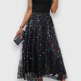 Falda de Lunares Colorida de Claire para un Estilo Vibrante y Confiado