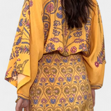 Vestido Boho Candela con Estampado Floral y Escote en V Cruzado para un look con estilo