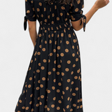 Lizzie Vestido Midi de Lunares con Elegante Escote en V Profundo