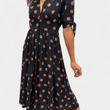 Lizzie Vestido Midi de Lunares con Elegante Escote en V Profundo