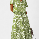 Rovena Vestido Midi de Lunares con Cuello Camisero y Cintura Ajustable - Elegancia y Comodidad para Cualquier Ocasión