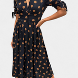 Lizzie Vestido Midi de Lunares con Elegante Escote en V Profundo