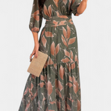 Elegante vestido largo floral Aísha con corte fluido y hermoso estampado de hojas