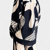 Conjunto de Pierna Ancha Basilisa con Estampado de Grafiti - Estilo Moderno y Vibrante