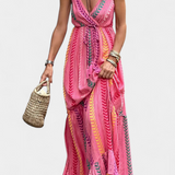 Elegante Vestido Largo Rosa con Rayas Multicolores para un Look Sofisticado