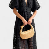 Vestido midi de manga abullonada con patrón de cuadros y detalle de caléndula