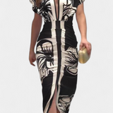 Elegante Vestido Largo Diva con Floral Estampado, Encantador Escote en V y Detallada Abertura Lateral