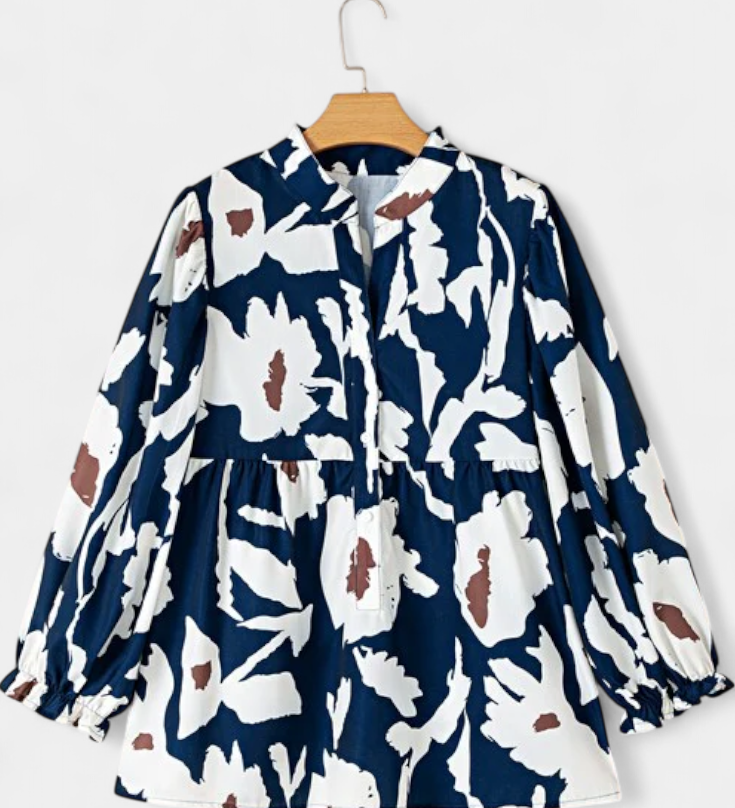 Filomena Blusa Elegante con Media Botonadura y Manga Abullonada en Estampado Floral Abstracto