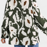 Filomena Blusa Elegante con Media Botonadura y Manga Abullonada en Estampado Floral Abstracto