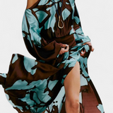 Elegante Monte Vestido Largo con Detalles en Mangas y Estampado Abstracto para una Mirada Sofisticada