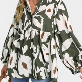 Filomena Blusa Elegante con Media Botonadura y Manga Abullonada en Estampado Floral Abstracto