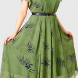 Elegante vestido midi de chiffon verde con corte en A para un estilo sofisticado