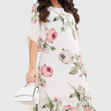 Elegante vestido de gasa fluida Tameka con detalles de pétalos y mangas transparentes