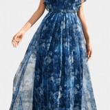 Elegante vestido largo de chifón con estampado floral y diseño aireado para un estilo sofisticado y cómodo