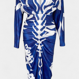 Elegante Vestido Largo Diva con Floral Estampado, Encantador Escote en V y Detallada Abertura Lateral