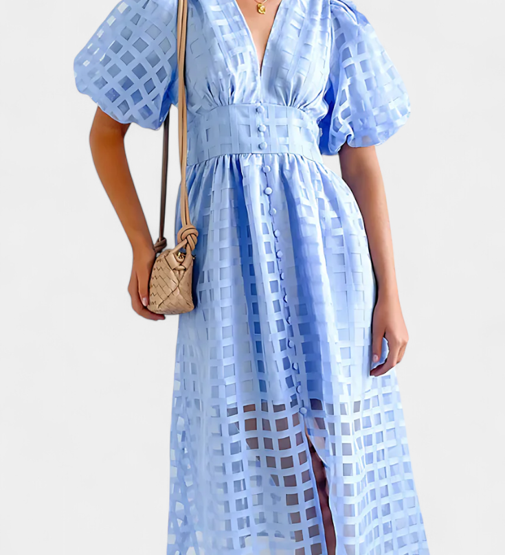 Vestido midi de manga abullonada con patrón de cuadros y detalle de caléndula