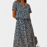 Rovena Vestido Midi de Lunares con Cuello Camisero y Cintura Ajustable - Elegancia y Comodidad para Cualquier Ocasión
