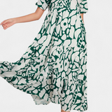Vestido Nélida de Tela Ligera con Estampado y Escote en V para un Estilo Elegante y Confortable