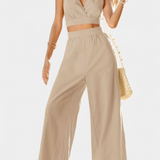 Elegante Conjunto de Chaleco de Encaje con Espalda Abierta y Pantalones Anchos para un Estilo Sofisticado