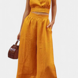 Elegante Conjunto de Chaleco de Encaje con Espalda Abierta y Pantalones Anchos para un Estilo Sofisticado