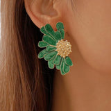 Elegantes pendientes Demi-Flor para un look sofisticado